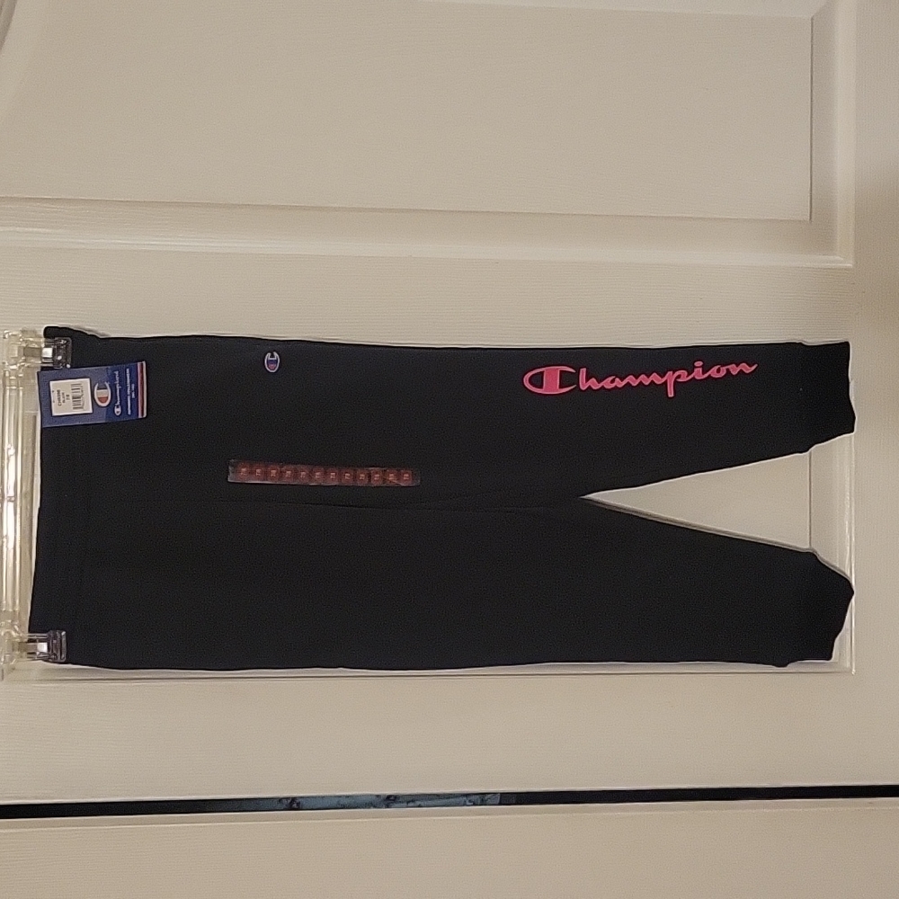 New Girls Champion Sweat Pants. Size 7/8. Black with Pink. Elastic bottom.